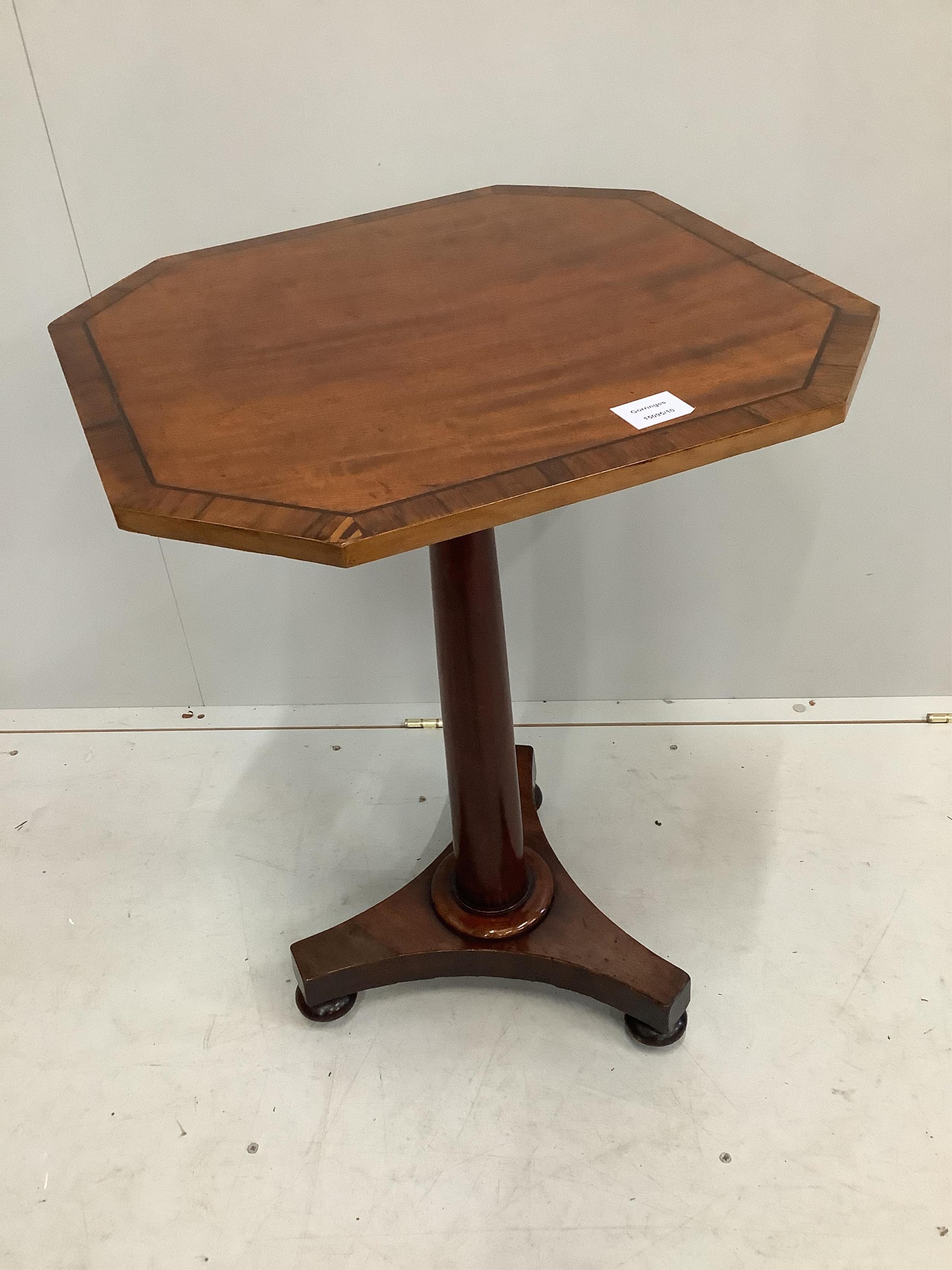 An early Victorian octagonal banded mahogany wine table, width 51cm, depth 50cm, height 71cm. Condition - fair